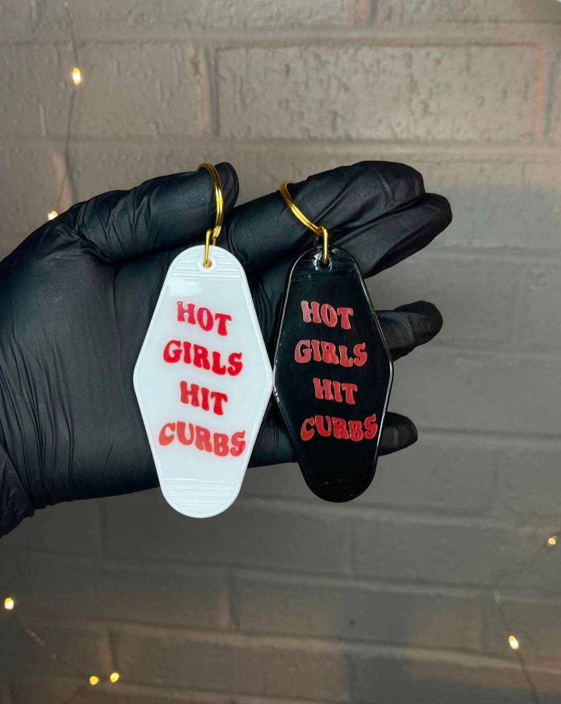 Hot girls hit curbs keychain