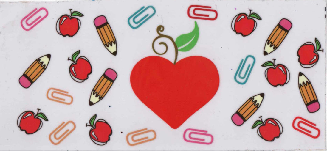 Teacher apples and pencils